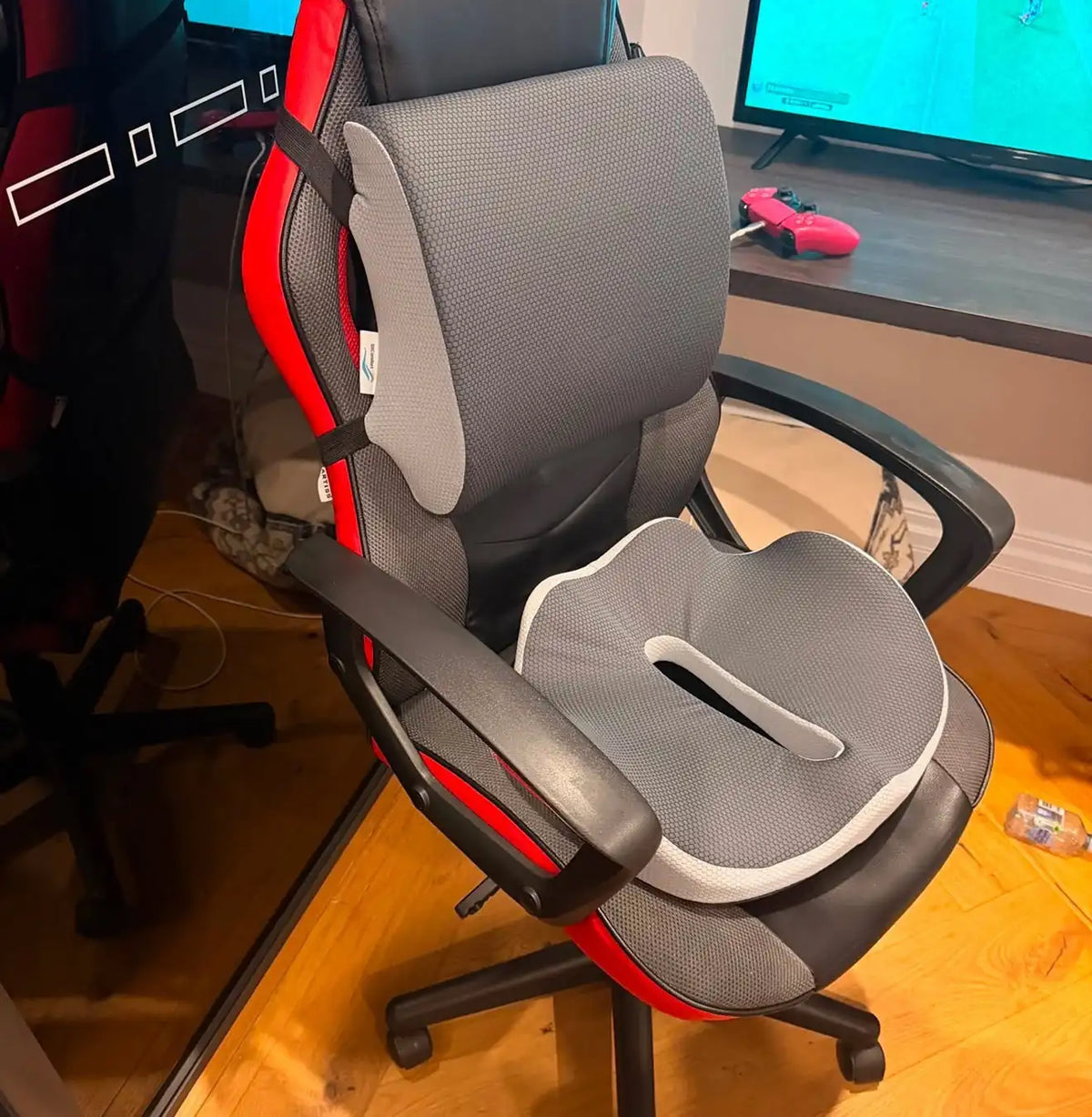 ErgoRelief seat cushion and LumbarEase lumbar support fitted to a red and black gaming chair